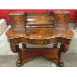 A Victorian burr walnut duchess dressing table, the top with two columns of small drawers framing