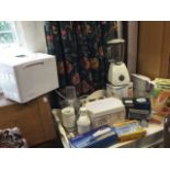 Miscellaneous electrical kitchen gear including a Kenwood bread maker, a Braun liquidiser, Britax