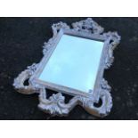 A Dutch style mirror in limed and painted composition frame, the rectangular bevelled plate