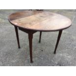A nineteenth century oval oak gateleg table, raised on tapering barrel column legs with pad feet. (