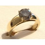 An 18ct yellow gold diamond ring, the round claw set stone weighing over two carats, mounted on a