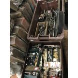 A box of miscellaneous engineering gear - wheels, cogs, tools, tap & dies, bolts, spanners,
