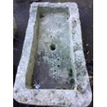 A rectangular nineteenth century stone trough. (38.25in x 19in)