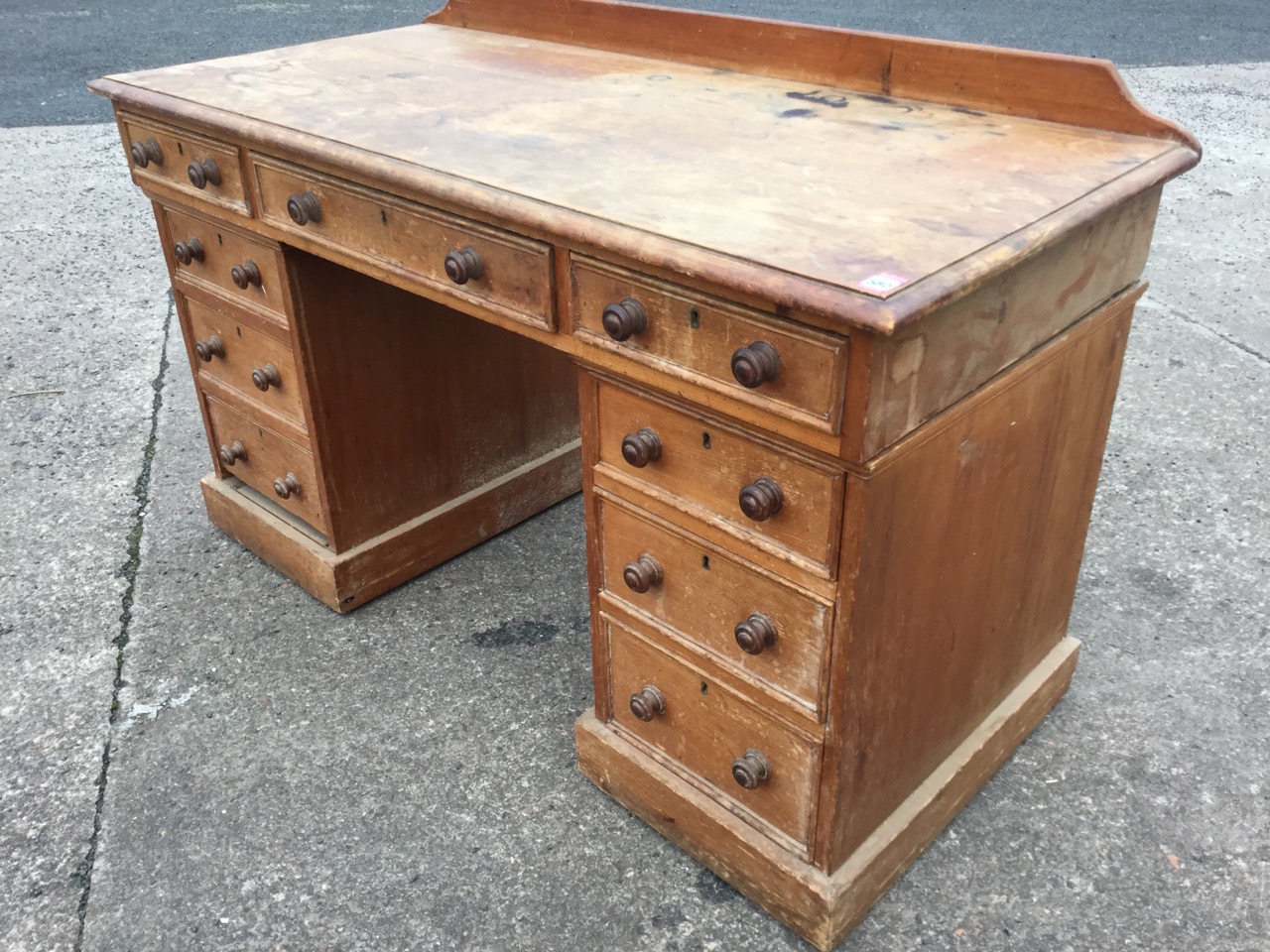A Victorian pine kneehole desk, the rectangular moulded top with three panelled frieze drawers on - Image 3 of 3