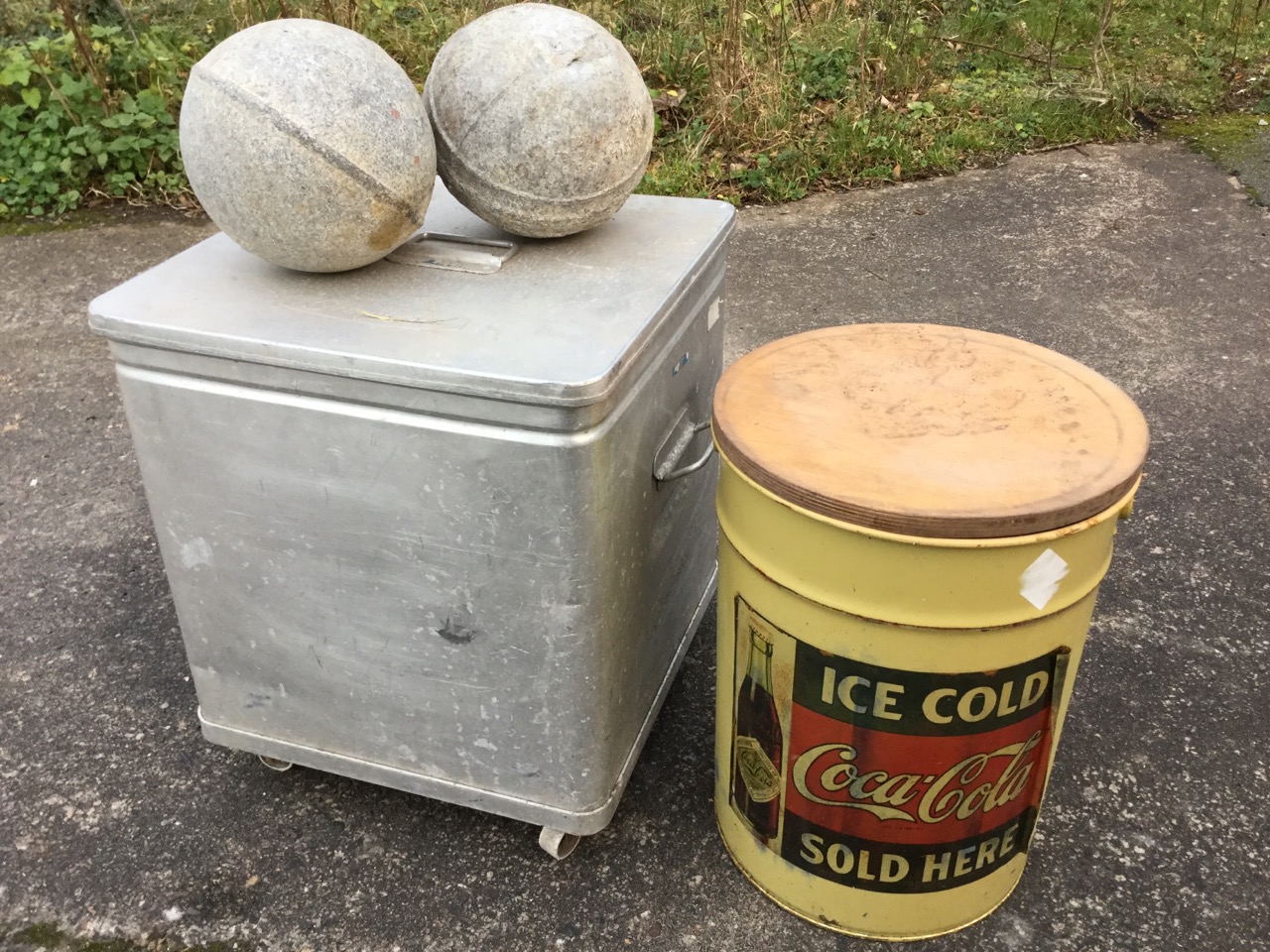 A square aluminium Grundybin & cover on casters; two galvanised ball fishing floats; and a tubular