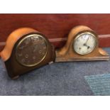 An oak cased domed mantle clock by the Northern Goldsmiths Co, the dial under convex glass with