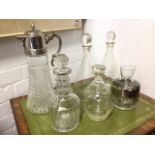 A tapering hobnail style claret jug with silver plated mounts having hinged lid and scrolled handle;