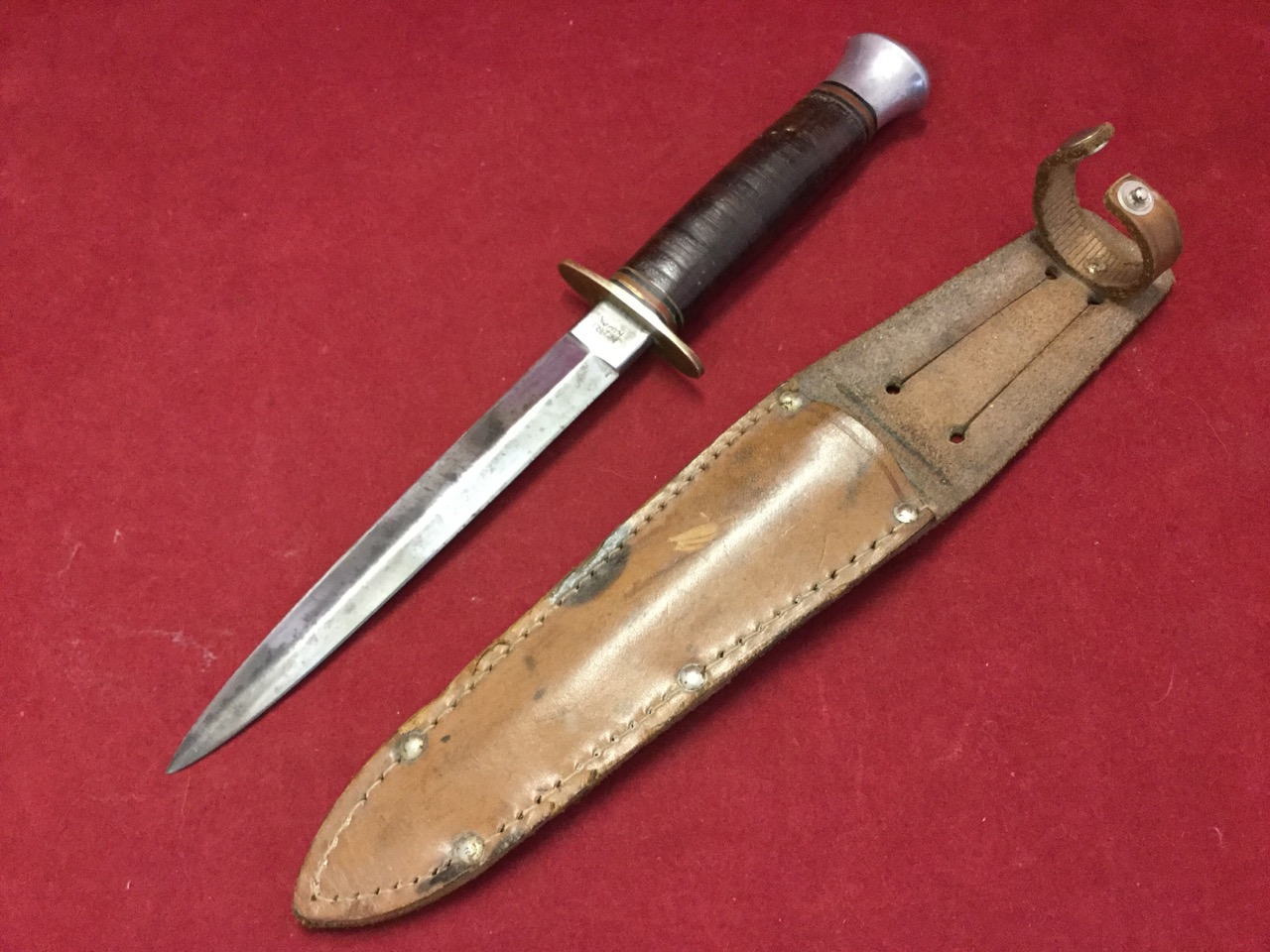 A WW2 Milbro Kampa commando knife, the Sheffield made tapering stiletto blade with brass guard and