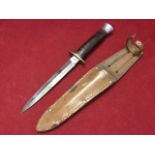A WW2 Milbro Kampa commando knife, the Sheffield made tapering stiletto blade with brass guard and