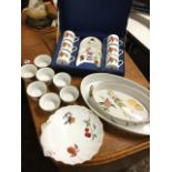 A boxed Royal Worcester coffee set decorated with fruit in the Arden pattern; and other Royal