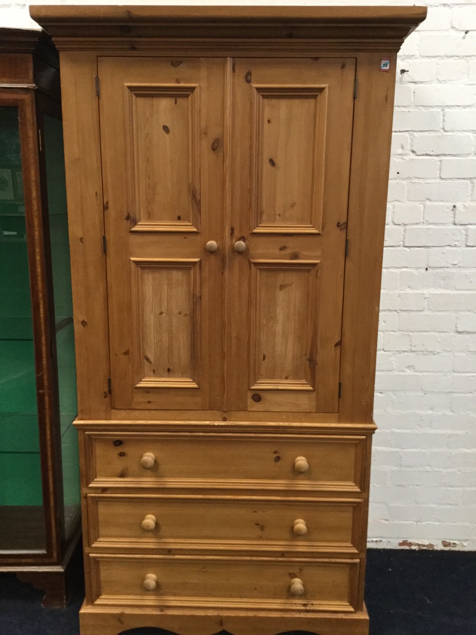 A Victorian style pine press with moulded cornice above panelled doors enclosing hanging space, - Image 2 of 3