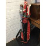 A set of Greensite Gradidge golf clubs in a Spalding bag, complete with golfing umbrella. (15)