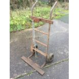 A welders trolley to hold acetylene cylinders, the ladderback with two chains, the barrow with