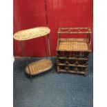 A cane tabletop wine rack with platform shelf and twelve bottle holders; and a rectangular rounded