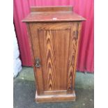 A Victorian pitch pine pot cupboard with panelled door enclosing shelf, supported on a plinth. (15in
