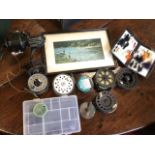 A 1969 framed Findhorn print; eight miscellaneous fishing reels; and other angling gear - flies,