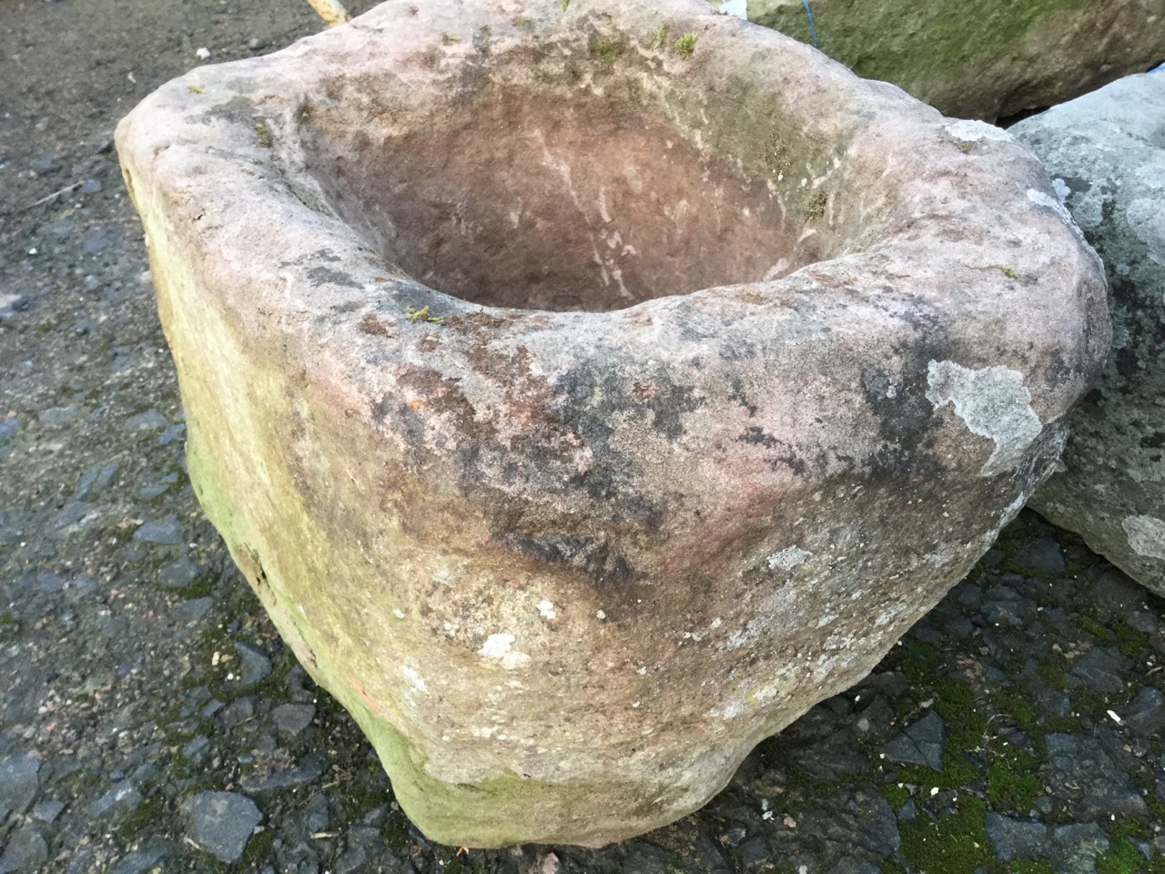 An ancient red sandstone quern. (18.5in x 15in) - Image 2 of 3