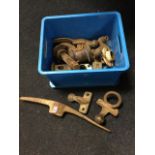 A box containing two Record 14lb cast iron mell heads; other pick axe and hammer heads; various