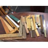 A collection of rulers - carpenters, drawing, oak, set square type, Rabone, some with brass