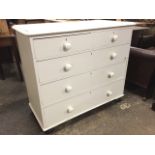 A Victorian painted pine chest of drawers, the rectangular moulded and rounded top above two short