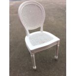 A single cane-seated side chair, with circular double-caned back in bead moulded frame, supported on