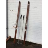 A pair of Austrian Trysil Knut wood skis, supplied by Lillywhites, with French bindings, complete