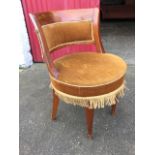 A nineteenth century French mahogany side chair, with rounded padded back above a circular