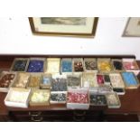 Twenty-eight boxes of buttons - metal, shirt buttons, horn, plastic, mother-of-pearl type, lustrous,