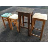 Four miscellaneous stools including an Edwardian high elm seat, two from the 60s, and one beech. (