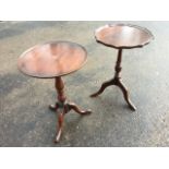 A circular scalloped top mahogany wine table, on fluted turned column with tripartite legs; and