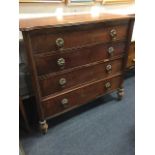 A nineteenth century mahogany chest of drawers, the rectangular top with reeded edge and