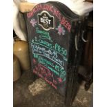 A pair of arched blackboard style A-frame display boards with hinged metal frames. (2)