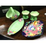 Five pieces of Maling pottery - a green bamboo floral dish, a pair of leaf moulded sundae dishes,