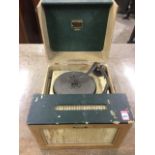 A 50s Dansette record player - model 32, the machine with hinged lid and front speaker, having