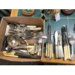 A quantity of silver plated flatware including a ladle, sets of knives, forks & spoons, a dessert