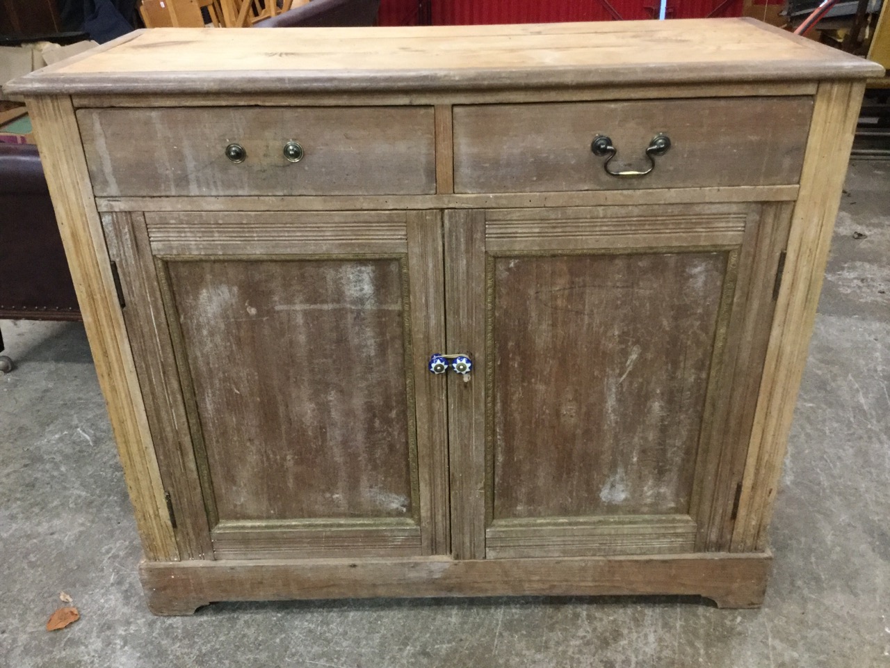 A late Victorian satin walnut cabinet with two drawers above panelled cupboards with applied press - Image 2 of 3