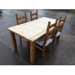 A rectangular pine table and chair set, with boarded panelled top on square column legs with waisted