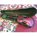 A cased Czechoslovakian violin, the instrument with twin-piece back, complete with a bow. (A/F)