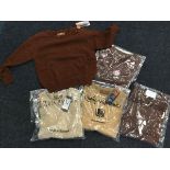 Five lambswool crewe neck children's jumpers - various brown/ fawn colours and sizes. (5)