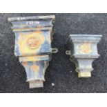 A large cast iron rainwater hopper, the rectangular chamber with tapering graduated mouldings,