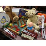 A childrens lot including two bears, Matchbox transporters, a Riverdance drum & beater, a boxed