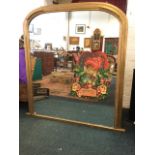 A large Victorian overmantel mirror with rounded moulded gilt & gesso frame on rectangular