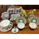 Miscellaneous ceramics including a pair of reproduction porcelain parrots, a pair of handpainted