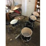 A Premier drum kit with adjustable stool, cymbals, snare, tom-tom, bass, hi-hat, etc. (A lot)