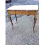 A Louis VI style walnut desk, the moulded top with gilt tooled leather skiver above shaped