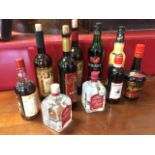 Ten bottles of liqueurs including Himbeerbrand, Wodka Weselna, Tia Maria, Killepitsch, Cherry Brandy