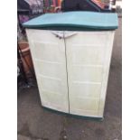 A 3ft garden storage cupboard with twin doors enclosing a shelved interior. (27in x 19.5in x 36in)