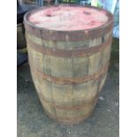 A 3ft oak barrel, the staves bound by six metal strap bands. (36in)