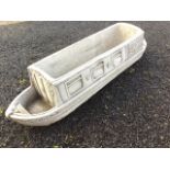 A composition stone plant trough modelled as a canal barge titled Lucy Ann. (33in)
