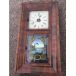 A Victorian American wallclock by Jerome & Co, with cushion moulded mahogany case having square dial